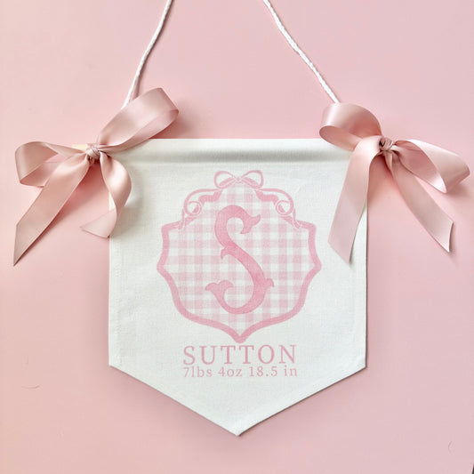 Personalized baby girl banner with floral crest design displayed on nursery crib custom name sign for baby shower gift idea unique newborn photo prop soft pink nursery wall decor for baby girl elegant custom baby name banner for crib or hospital door handmade baby girl room sign perfect for baby shower gift basket or first birthday photos custom heirloom nursery decoration for little girl timeless floral baby name sign for newborn announcement or photography backdrop girl wall nursery decor pink