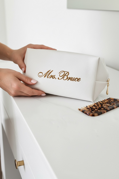 Bride makeup bag wedding day cosmetic pouch for bride getting ready gift bridal shower engagement present honeymoon travel toiletry bag white bride clutch personalized bridal party matching makeup bags for bridesmaids maid of honor gift best friend wedding keepsake cosmetic organizer for wedding morning flat lay white bridal makeup pouch with zipper elegant bride accessories photography prop for wedding day cosmetic bag makeup holder bride engagement gift best friend future Mrs unique gift idea