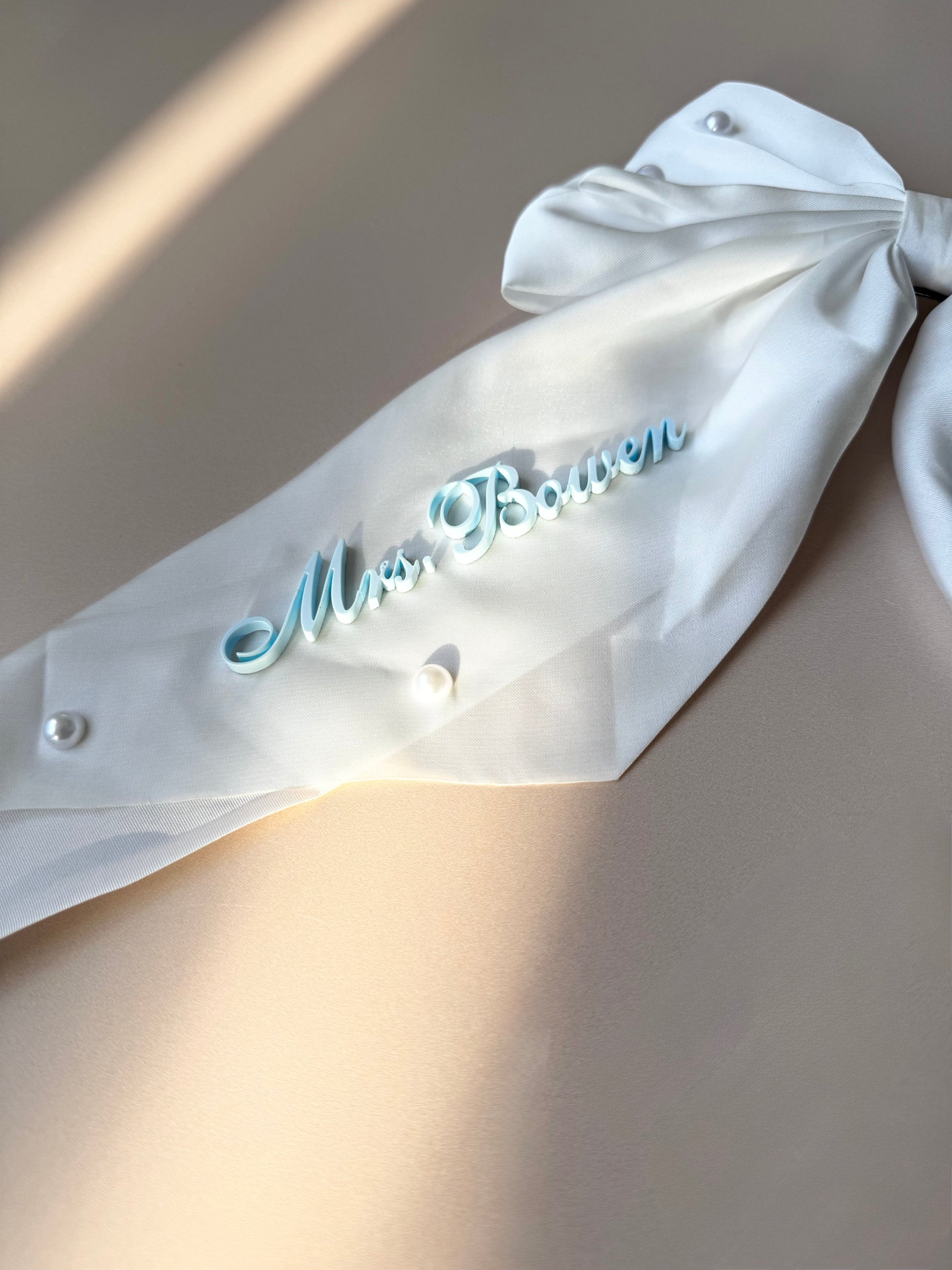 Personalized Bride Pearl Bow Hair Clip Custom Name Satin Hair Bow White Long Ribbon Barrette Bridal Party Accessory Wedding Hairpiece for Bride Bridesmaid Maid of Honor Elegant Half Updo Hair Accessory Gift Idea for Bridal Shower Bachelorette Bride to Be Keepsake Romantic Pearl Hair Bow for Wedding Day Bride Hairstyle Accessories Custom Satin Ribbon Name Hairpiece for Bride and Bridesmaid hair accessory for bride something blue bow with name bride keepsake gift for daughter wedding day hairpiece