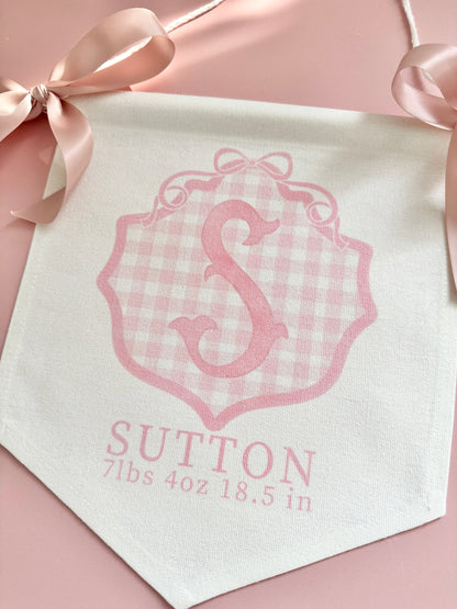 Personalized baby girl banner with floral crest design displayed on nursery crib custom name sign for baby shower gift idea unique newborn photo prop soft pink nursery wall decor for baby girl elegant custom baby name banner for crib or hospital door handmade baby girl room sign perfect for baby shower gift basket or first birthday photos custom heirloom nursery decoration for little girl timeless floral baby name sign for newborn announcement or photography backdrop girl wall nursery decor pink